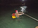 00396-2567 John Brush crossing the river in the Clearwater Cave - Photo by Garry K Smith